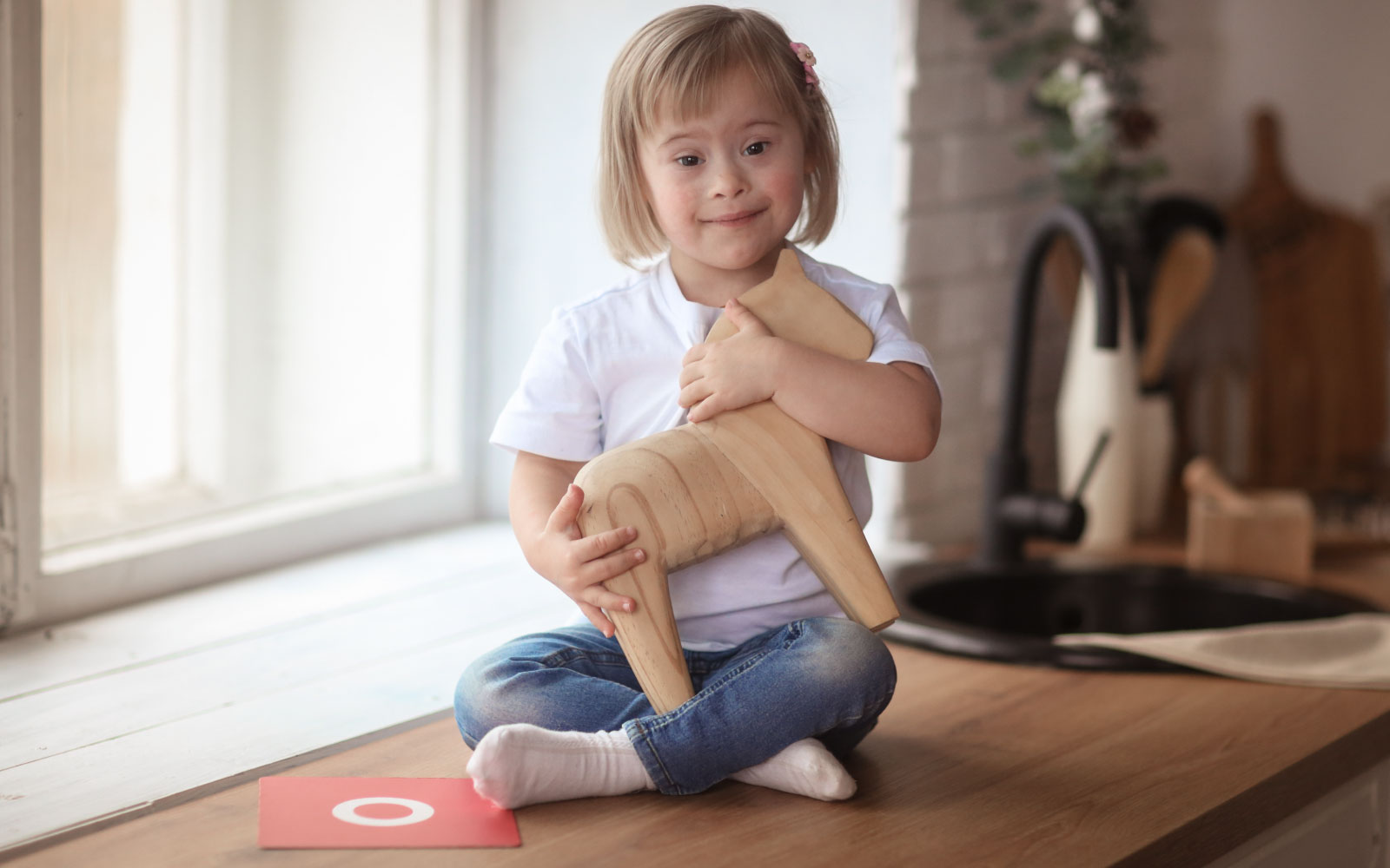 Just ONE Health and Social Care | Providing Care, Support & Accomodation | Child with wooden horse